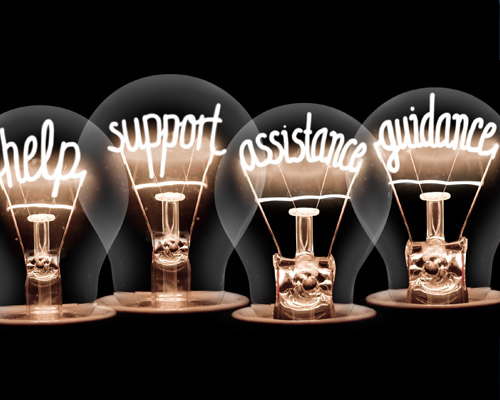 lightbulb filaments spelling out help support assistance guidance